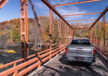 Load image into Gallery viewer, TrifectaALX_20Sierra1500Silver_Rear_DrivingBridge.jpg