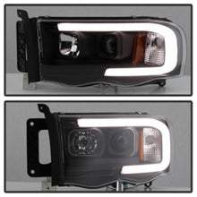 Load image into Gallery viewer, Spyder 02-05 Dodge Ram 1500 Light Bar Projector Headlights - Black (PRO-YD-DR02V2-LB-BK)